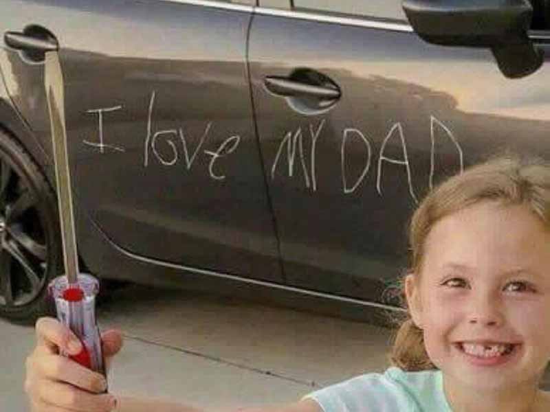 "I love my dad" scratched on car